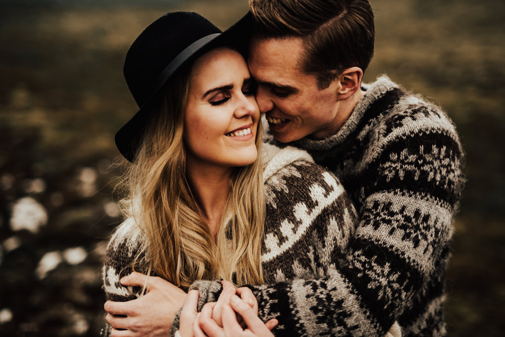 couple hugging during couple shoot in iceland with swedish photographer